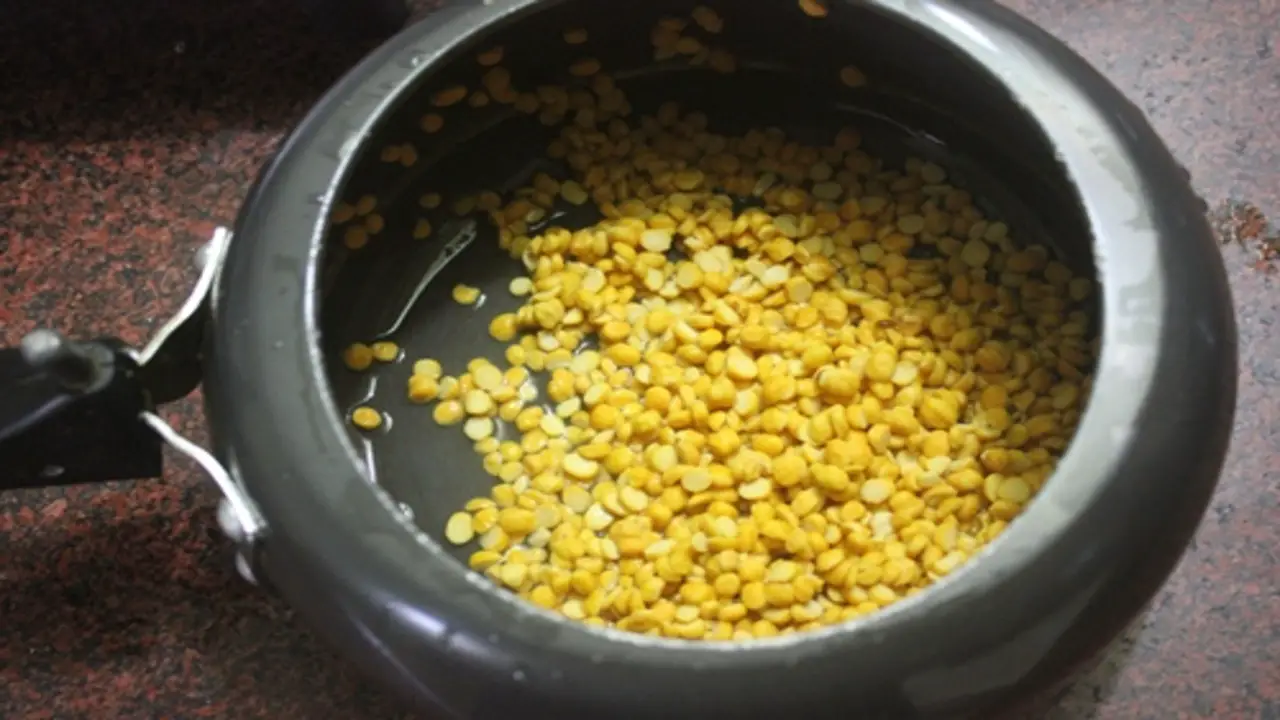 Drain And Grind The Chana Dal To A Paste