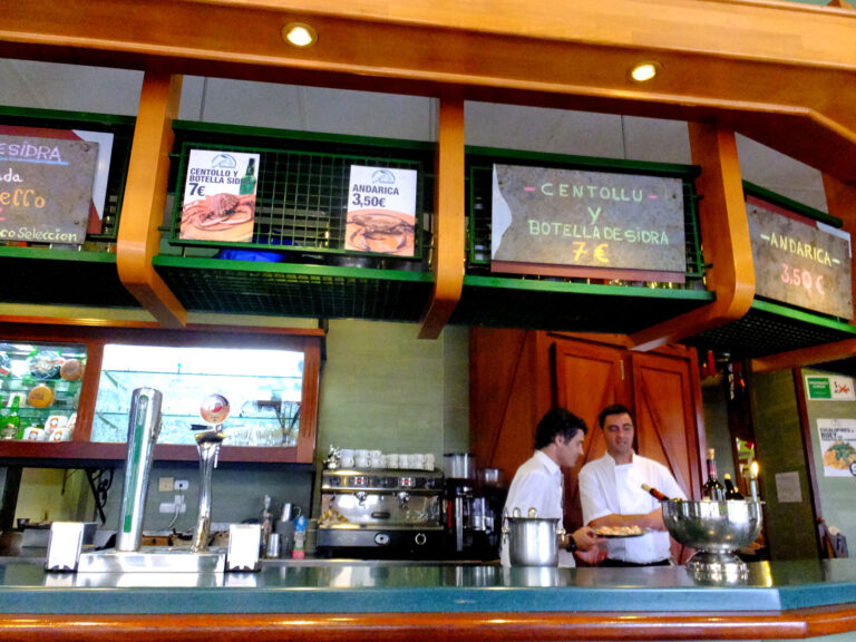 Pouring Asturian cider in a sidrería