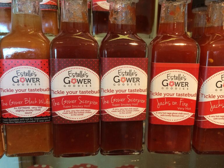 Shelf of hot sauce bottles