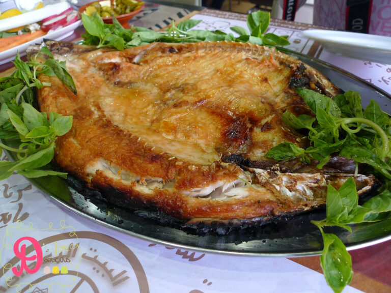 Iraqi masgouf grilled carp