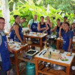 Cooking class preparing Thai dishes