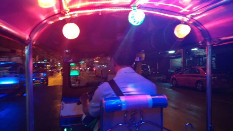 Tuk-tuk on a Bangkok street at night